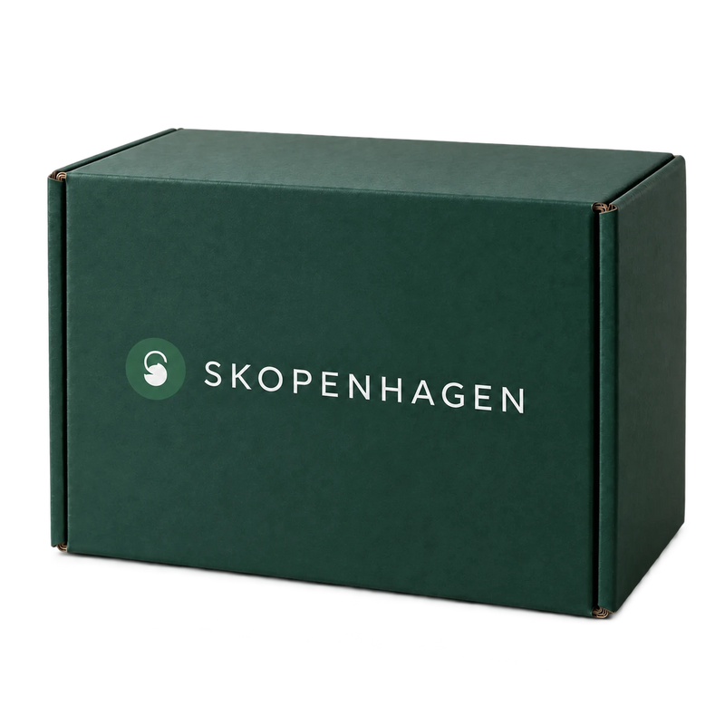 Skopenhagen branded forest-green parcel carton, isolated on a transparent background